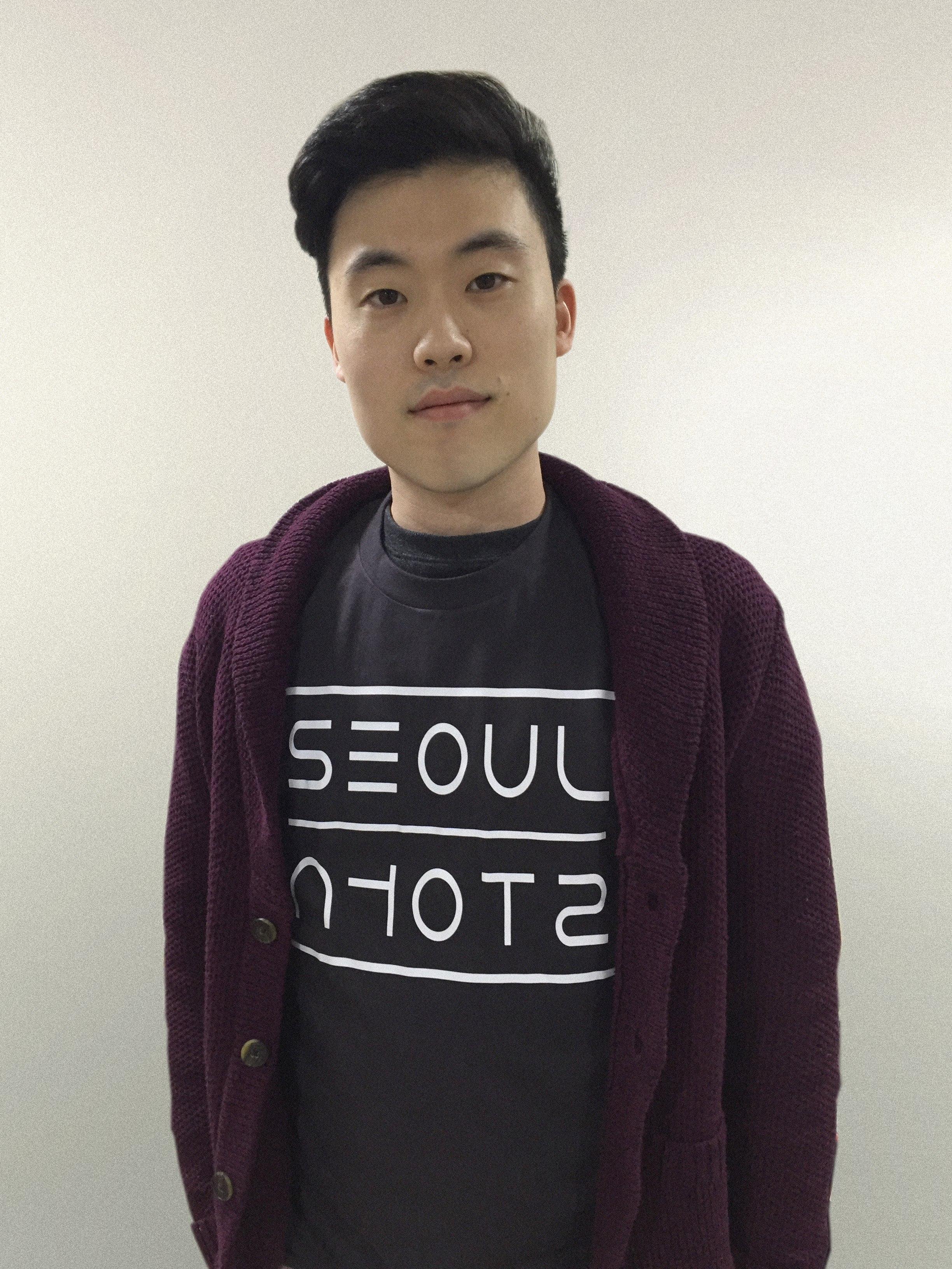 The Seoul T-shirt features "Seoul" in both Roman and Hangul scripts in a strikingly modern manner. 