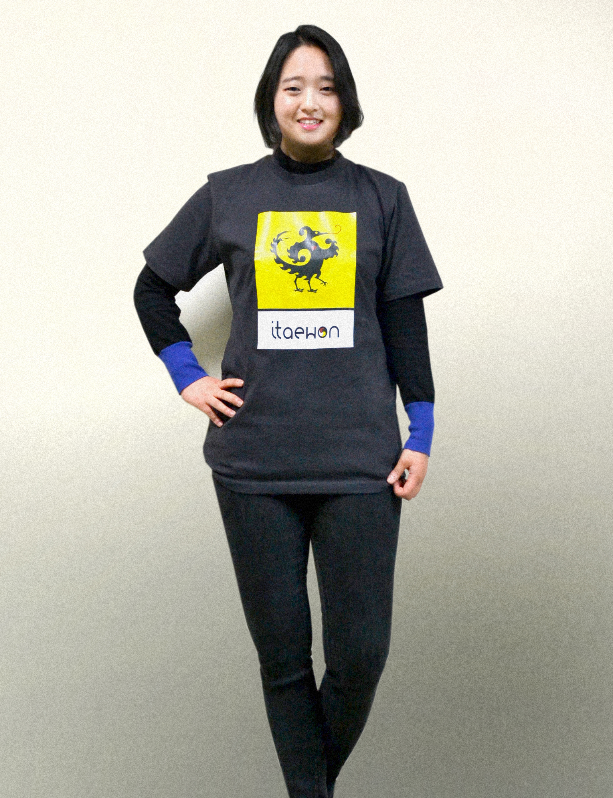 The Itaewon T-shirt features Sam Jok-o, the three legged phoenix accompanied by the triskelion that is a universal symbol for balance and eternity.